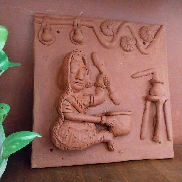 Woman in a kitchen - Terracotta Tile