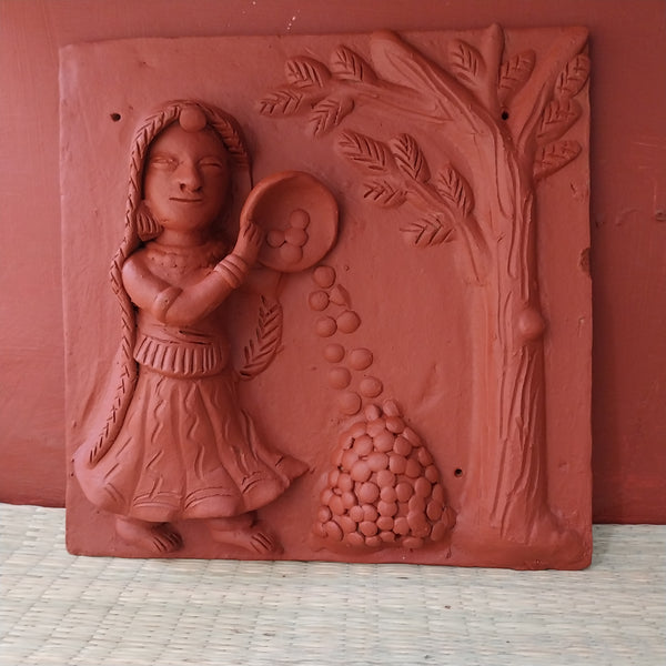 Lady cleaning grains  - Terracotta Tiles