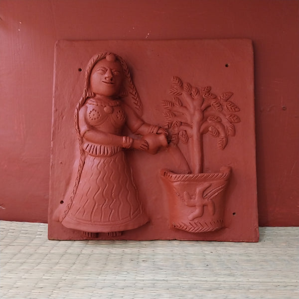 Lady watering Tulsi Terracotta Tile