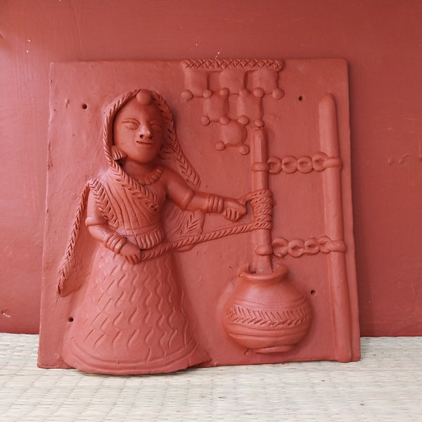 Woman churning milk - Terracotta Tile