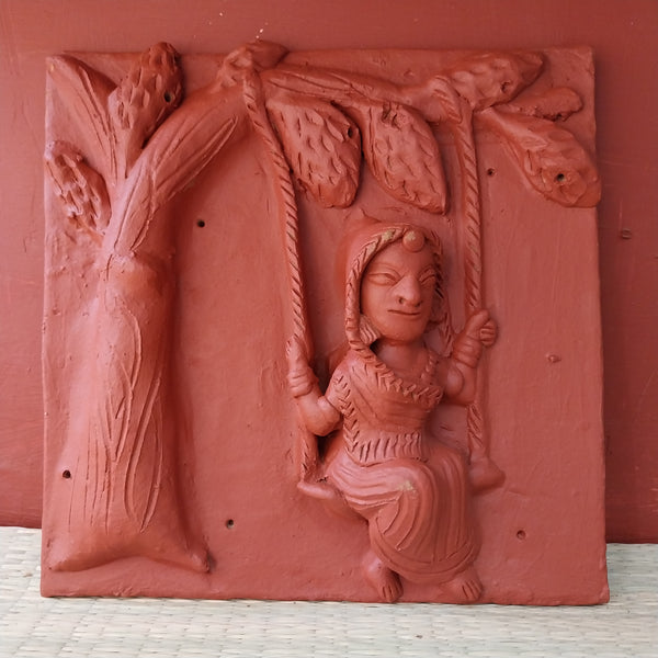 Woman on a swing - Terracotta Tile