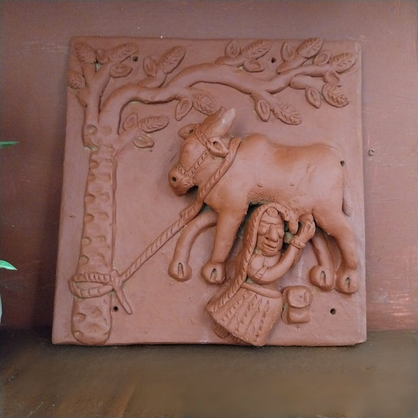 Milking a cow  - Terracotta Tile