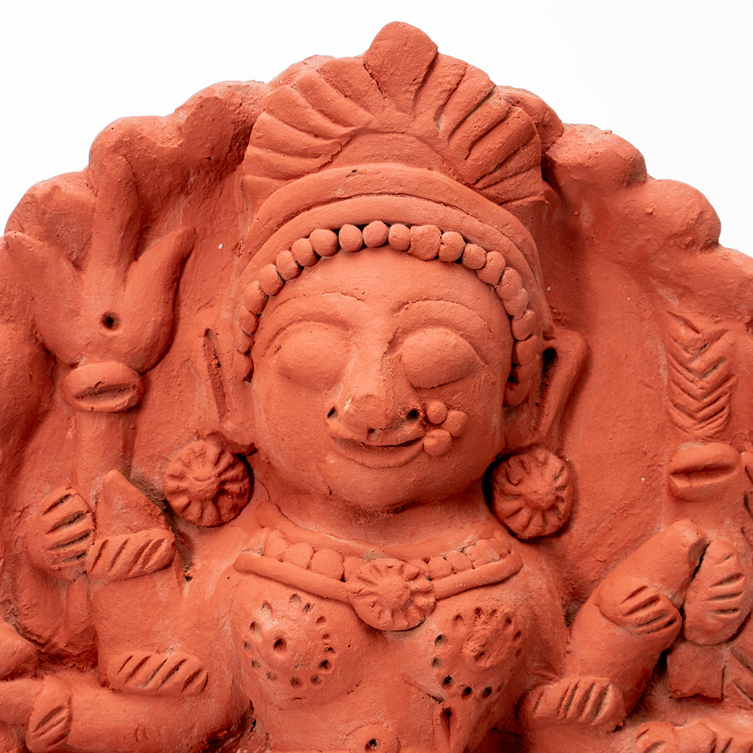 Goddess with Fish Terracotta Plaque