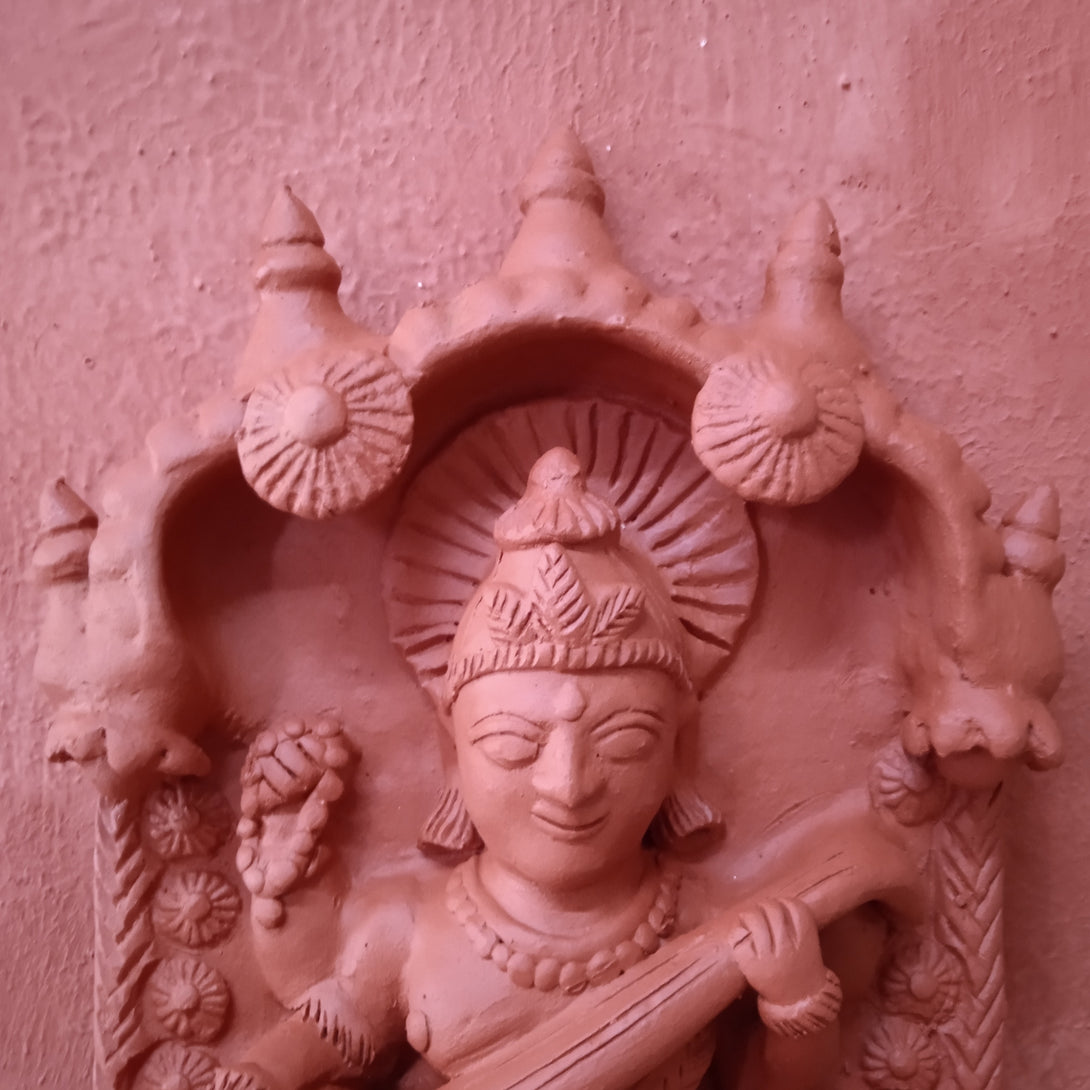 Goddess Saraswati terracotta plaque