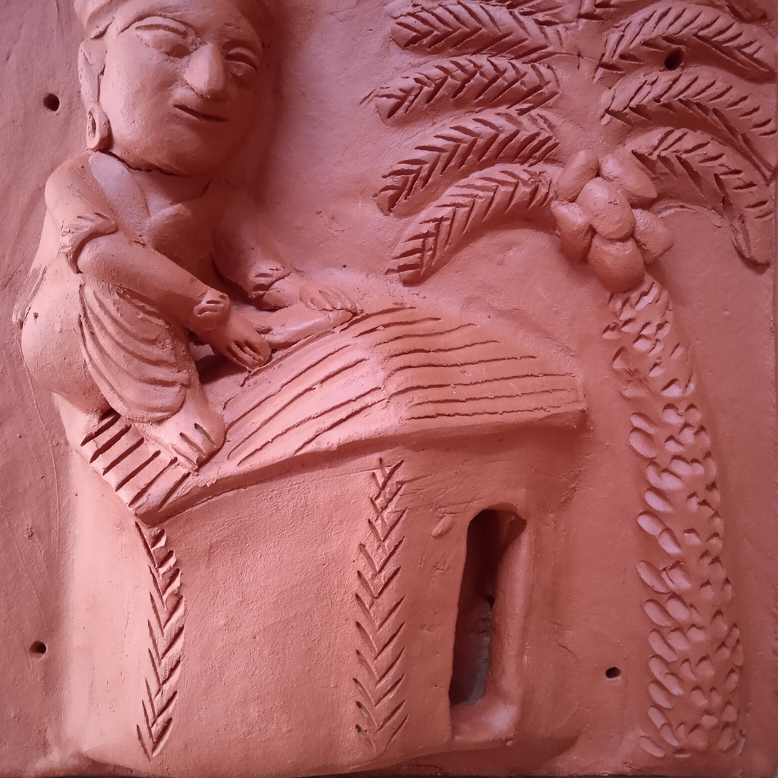 Terracotta Man making a roof